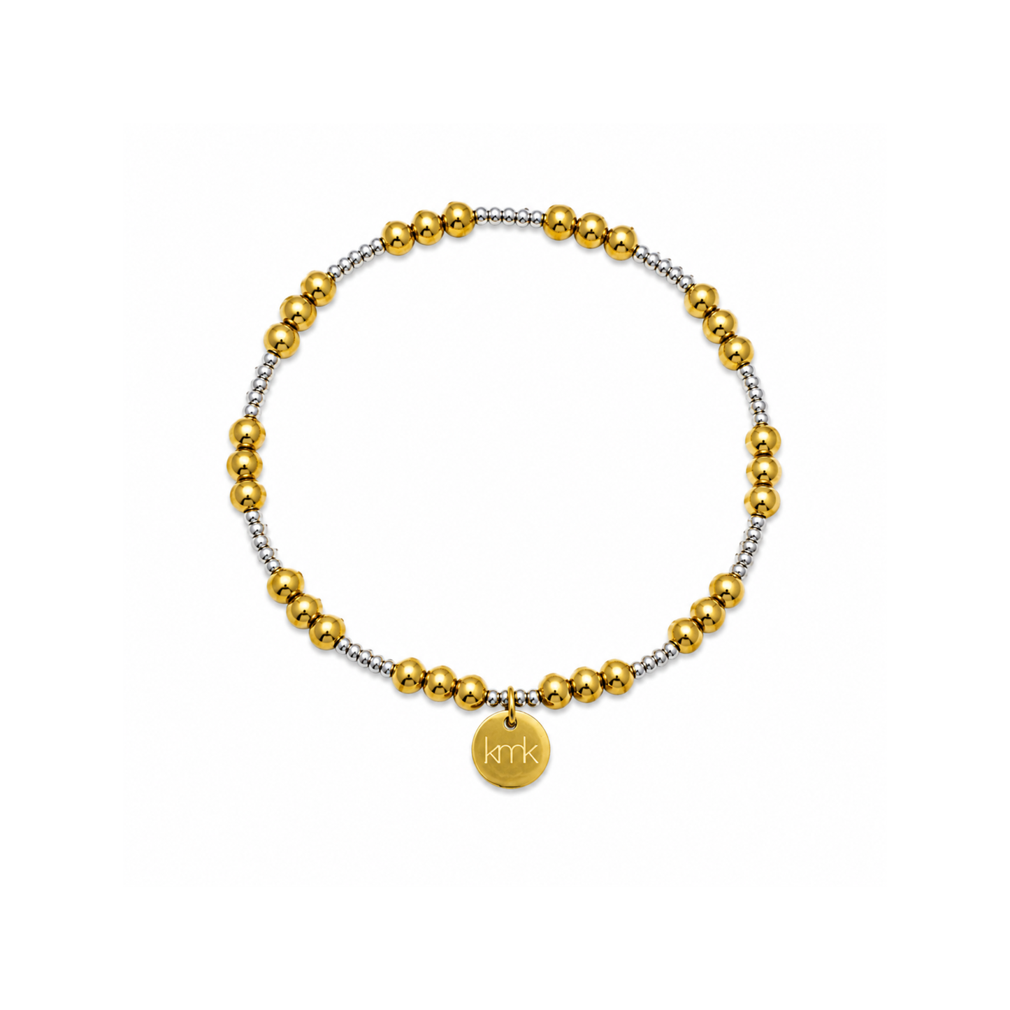 A beaded stretch bracelet featuring alternating polished gold and textured silver beads, with a small round gold disc charm engraved with the name 'KMK'.