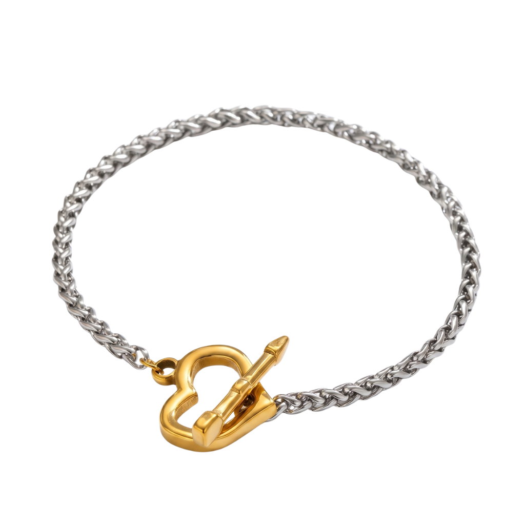 Bracelet with gold heart toggle clasp on a white background