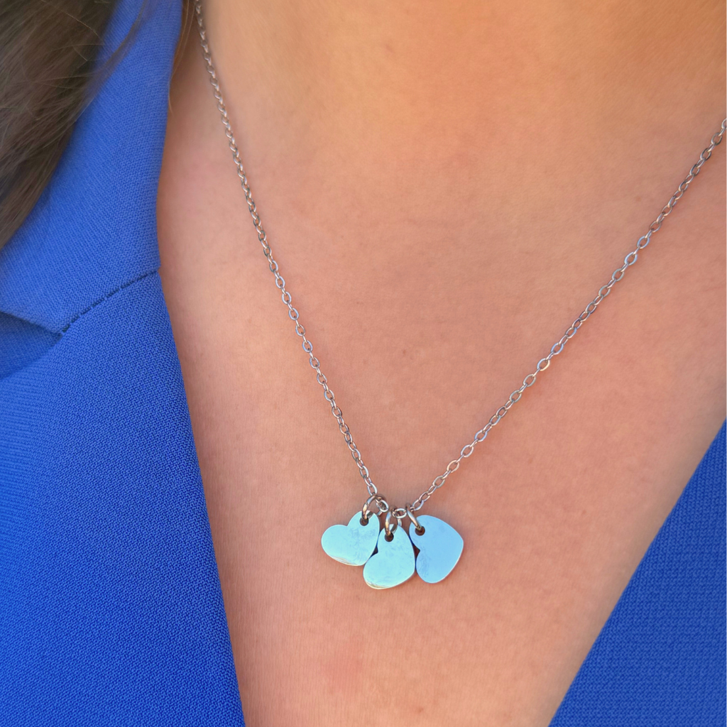 Silver necklace with three heart charms