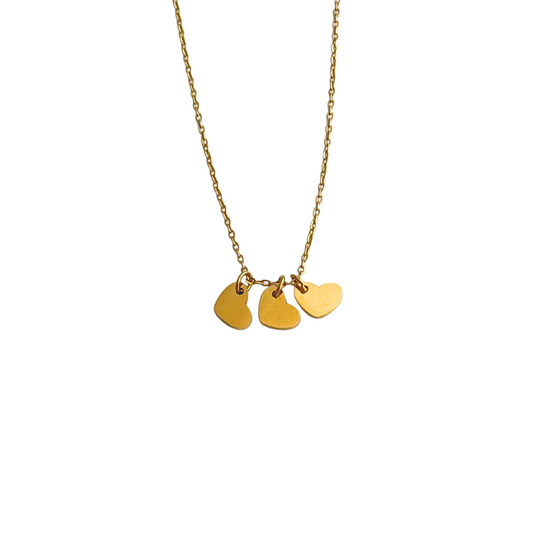 Gold necklace with three heart charms