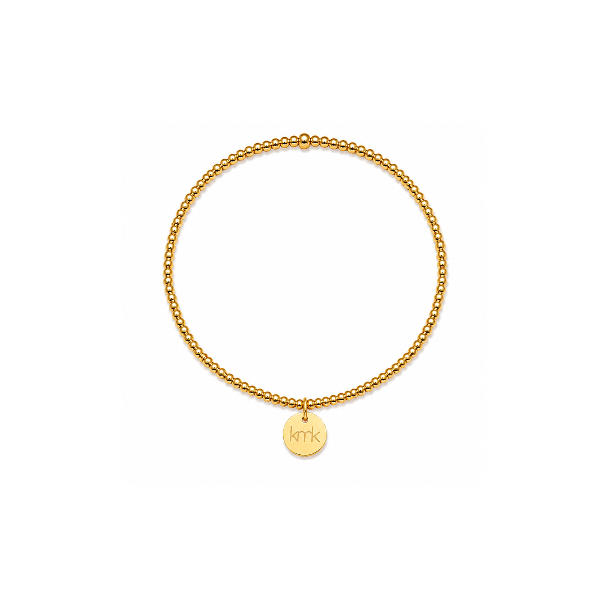 A delicate gold chain bracelet with a small round gold disc charm engraved with the initials 'kkk', displayed on a clean white background.