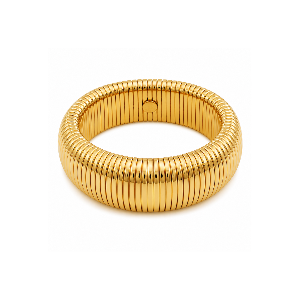 A gold-plated snake skin bangle bracelet with a textured, ribbed pattern, shown on a plain white background.