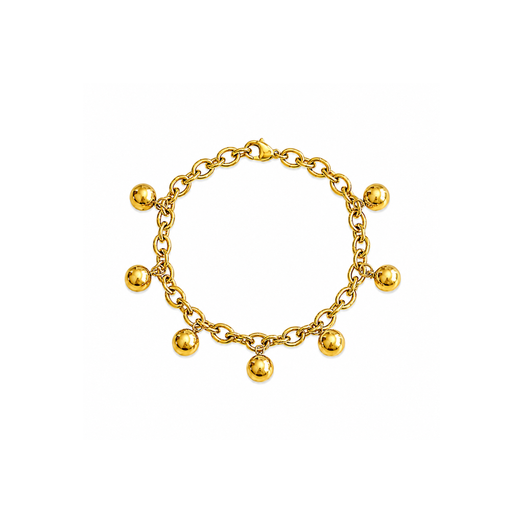 A gold chain bracelet with seven polished ball charms of varying sizes, displayed on a clean white background.