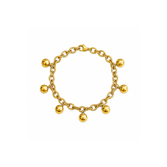 A gold chain bracelet with seven polished ball charms of varying sizes, displayed on a clean white background.