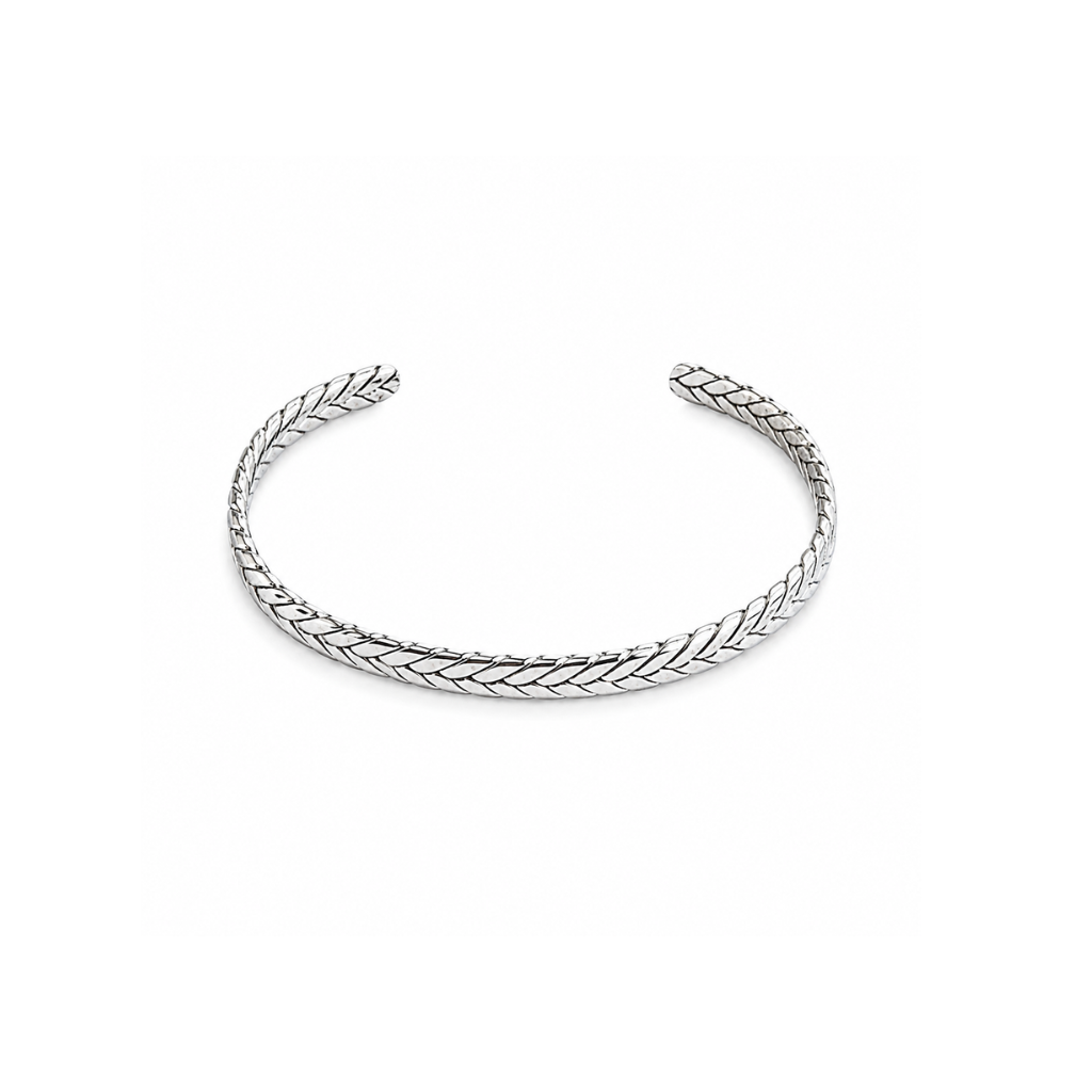 A silver open cuff bracelet with a textured, woven chevron pattern, displayed on a clean white background.