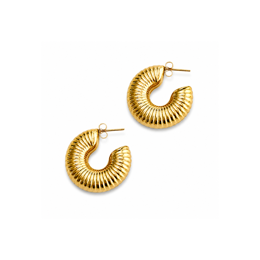 A pair of textured gold crescent-shaped hoop earrings with post backs, displayed on a clean white background.