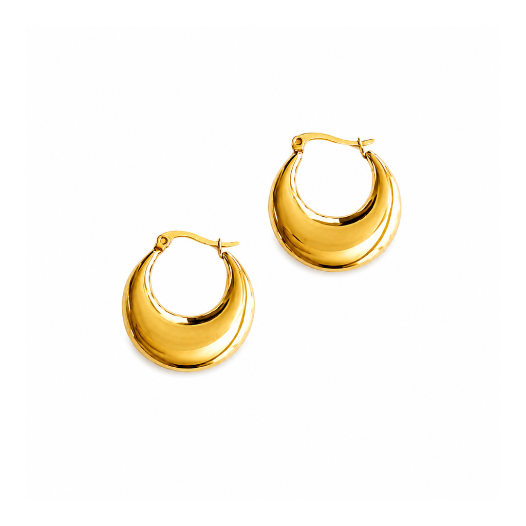 A pair of polished gold crescent-shaped hoop earrings on a clean white background.