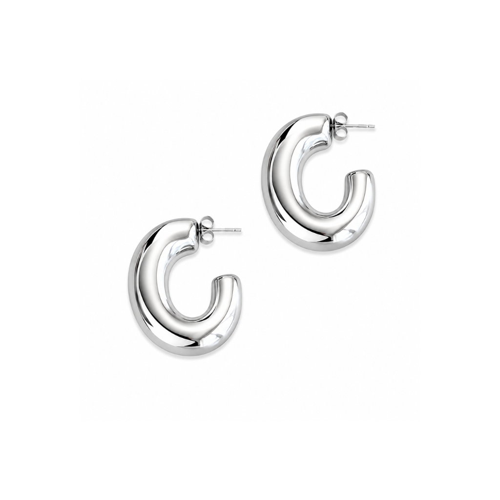 A pair of polished silver hoop earrings with a thick, rounded 'C' shape design and post backings, shown on a clean white background.