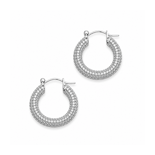 A pair of silver hoop earrings adorned with rows of small clear pavé stones, displayed on a clean white background.