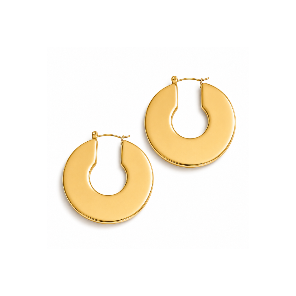 A pair of gold-toned hoop earrings with a thick, open circular design, displayed on a clean white background.