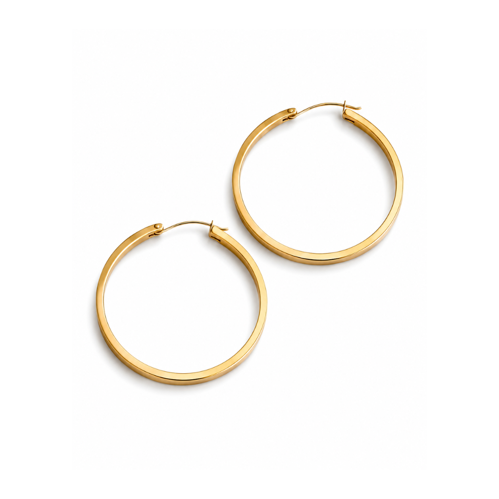 A pair of polished yellow gold hoop earrings on a clean white background.
