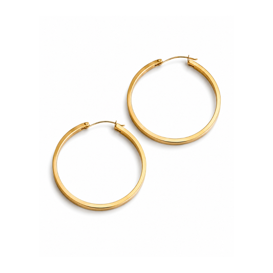 A pair of polished yellow gold hoop earrings on a clean white background.