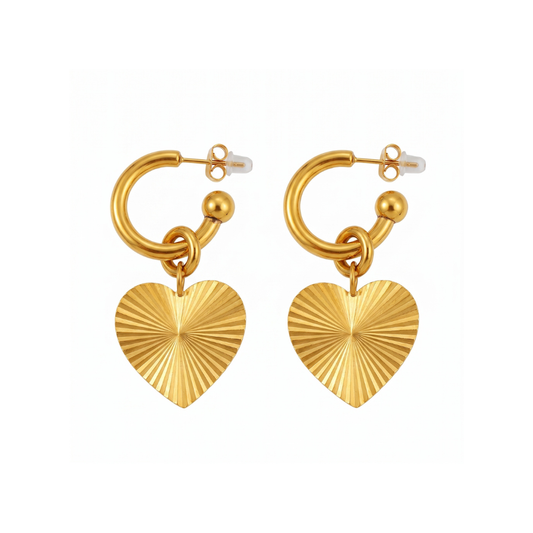 A pair of gold hoop earrings with dangling heart charms featuring a sunburst radial pattern, shown on a plain white background.