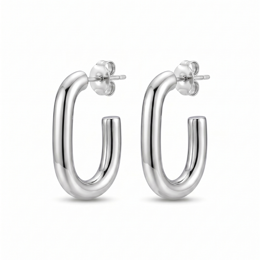 A pair of polished silver hoop earrings with a thick, rounded tubular design and butterfly backings, shown on a clean white background.