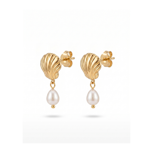A pair of gold shell-shaped drop earrings with dangling white pearl beads, shown on a clean white background.