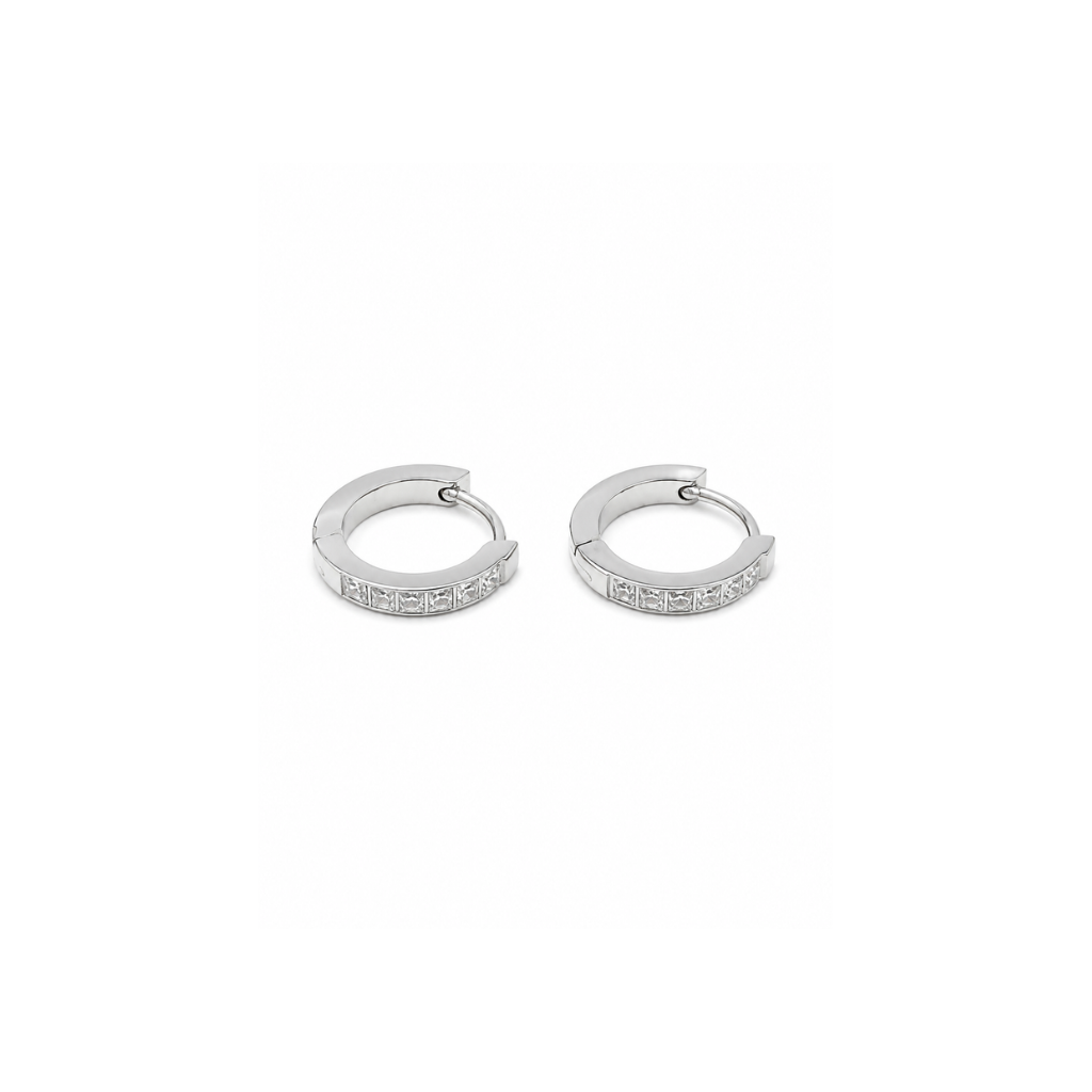 silver cubic zirconia hoop huggies on white background
