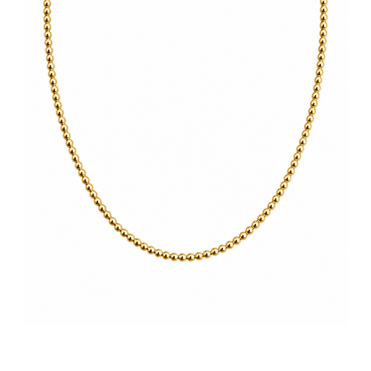 A delicate gold beaded chain necklace, shown in a U-shape against a solid white background.