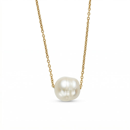 Pearl necklace on a gold chain against a white background
