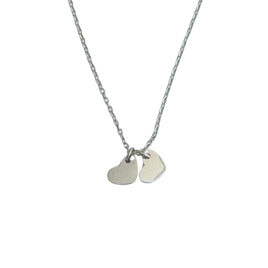 Silver necklace featuring two heart charms