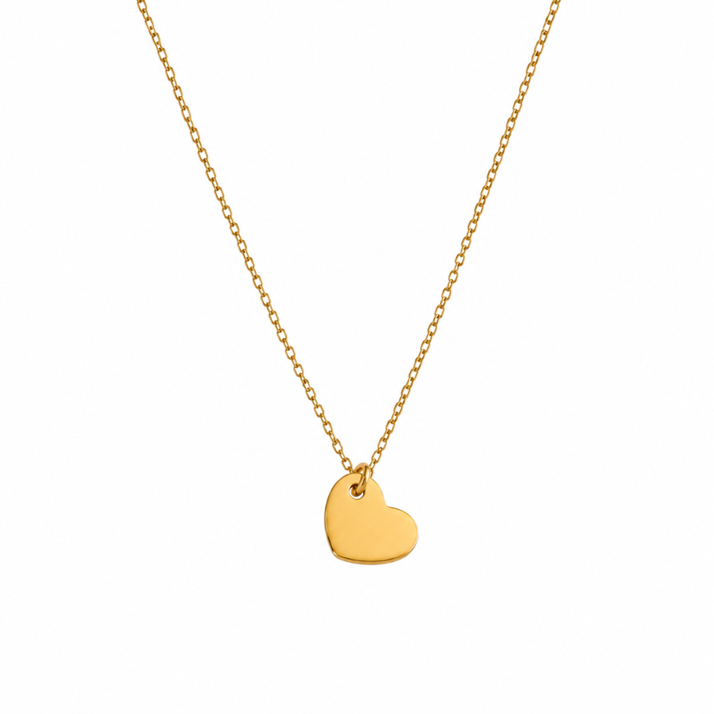 A delicate gold chain necklace with a small, polished gold heart pendant, displayed against a solid white background.