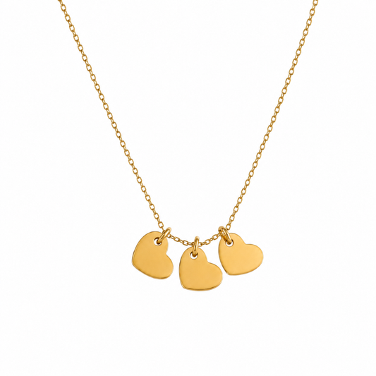 Gold necklace with three heart charms