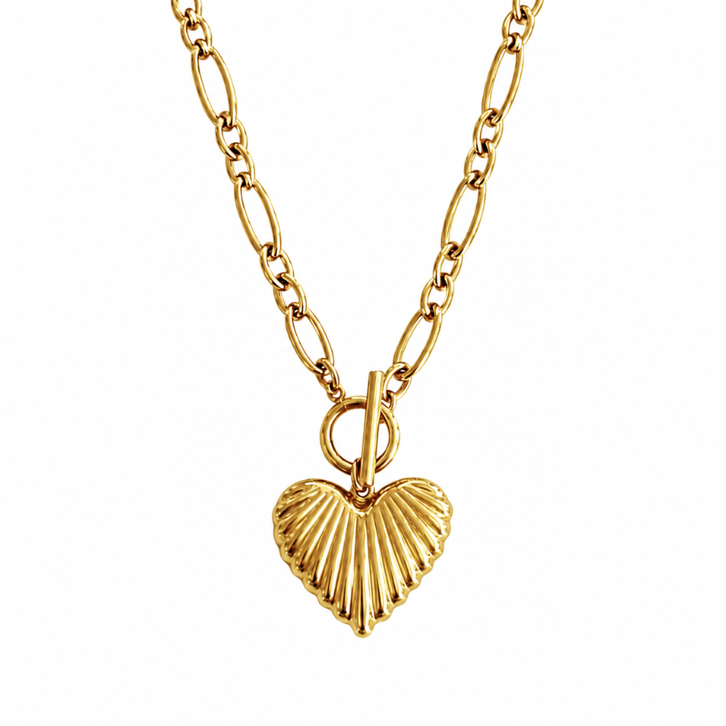 A gold chain necklace featuring a textured, ribbed heart-shaped pendant, displayed against a solid white background.