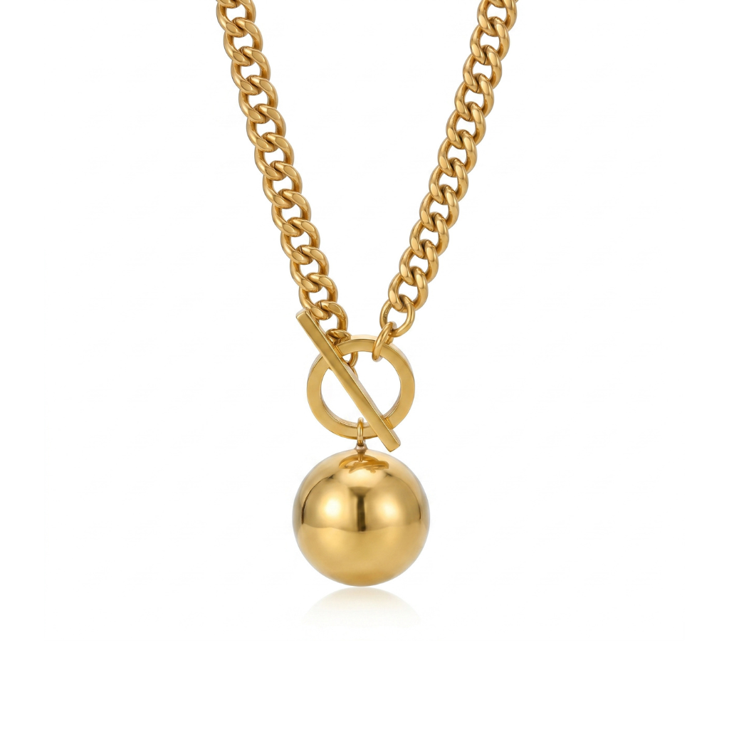 Gold necklace with a round pendant on a white background