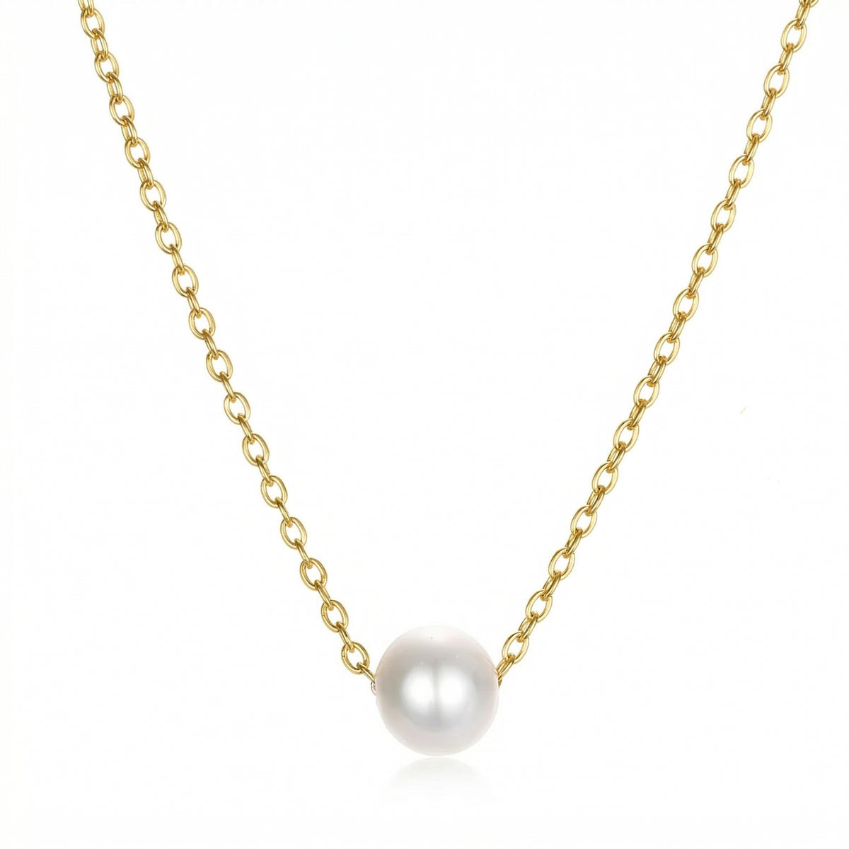 Gold necklace with a single pearl pendant on a white background